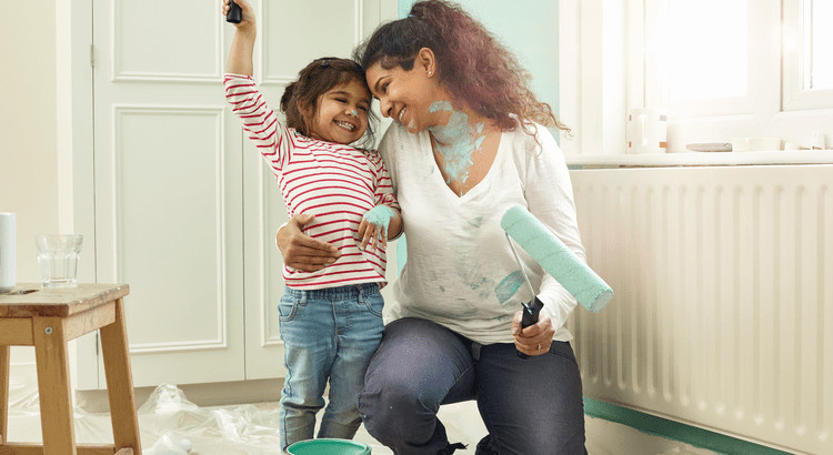 A mother and child with paint